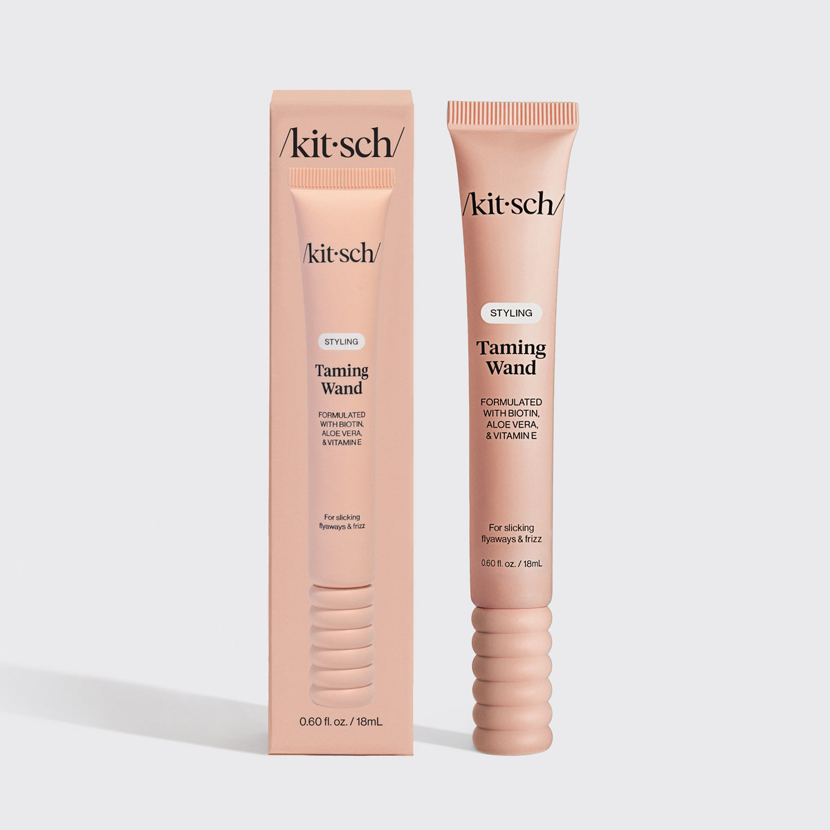 KITSCH Styling Taming Wand — packaging shot of the retail box beside the pink tube on a light gray background — compact packaging makes it easy to style on the go — glide spoolie over flyaways, frizz, and edges for a smooth, polished finish