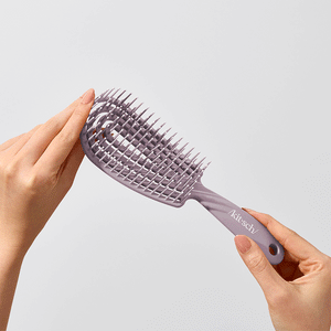 Brosse démêlante flexible violet pâle