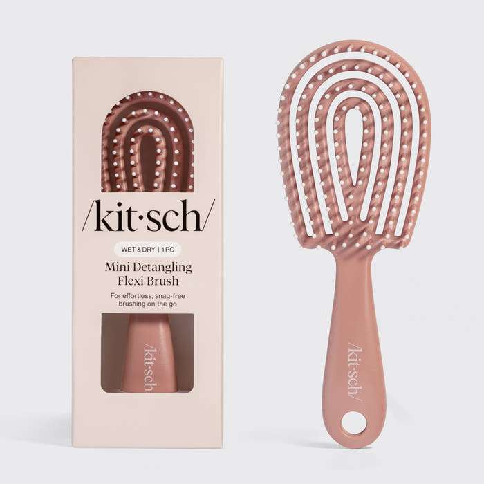 Terracotta Kitsch Detangling Flexi Brush Mini on a soft neutral background