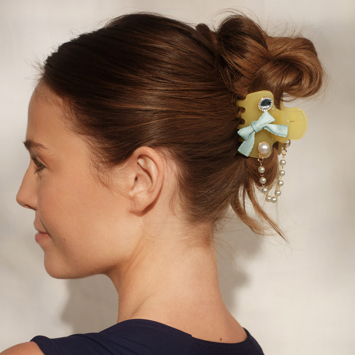 Model wearing butter yellow KitschPop Cloud Clip with Coastal Cottage Charm Collection – mint bow and pearl chain
